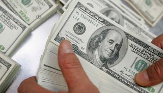 El dólar subió a $30,81, ahora presionado por una nueva devaluación del real