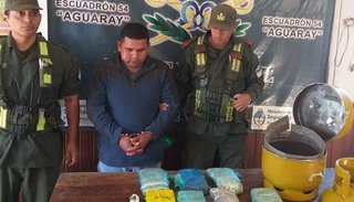 Llevaba más de 12 kilos de cocaína en una garrafa