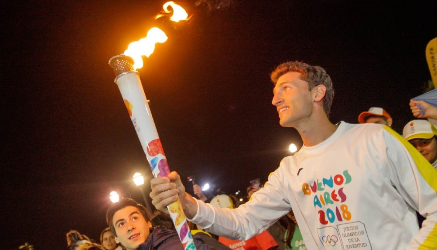 Que simboliza el fuego online de la antorcha olímpica